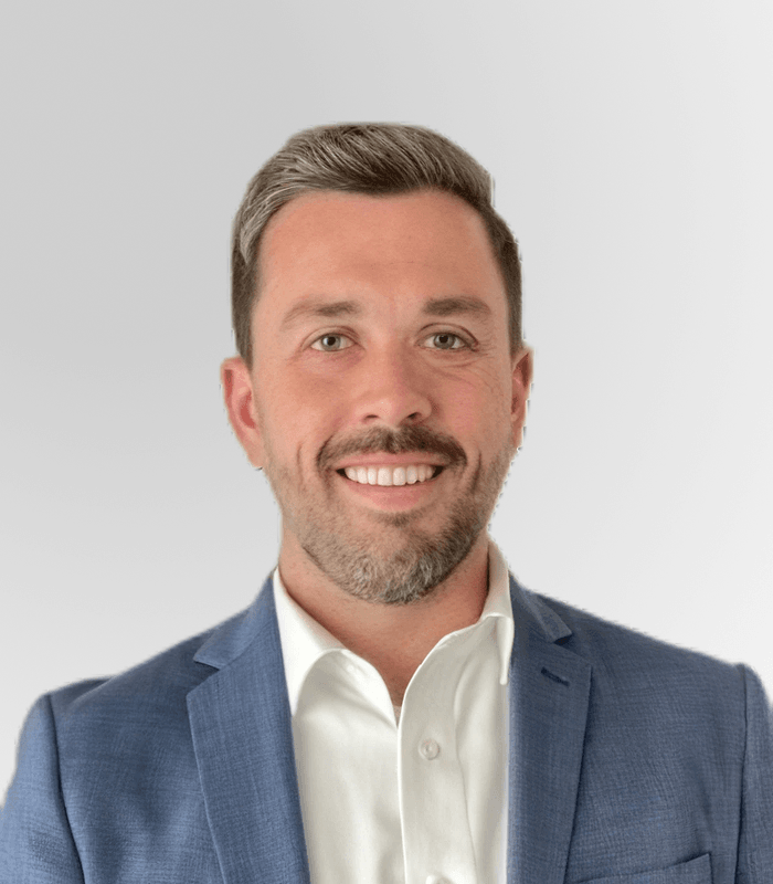 Headshot of Ian Isaacson, VP of Corporate Operations